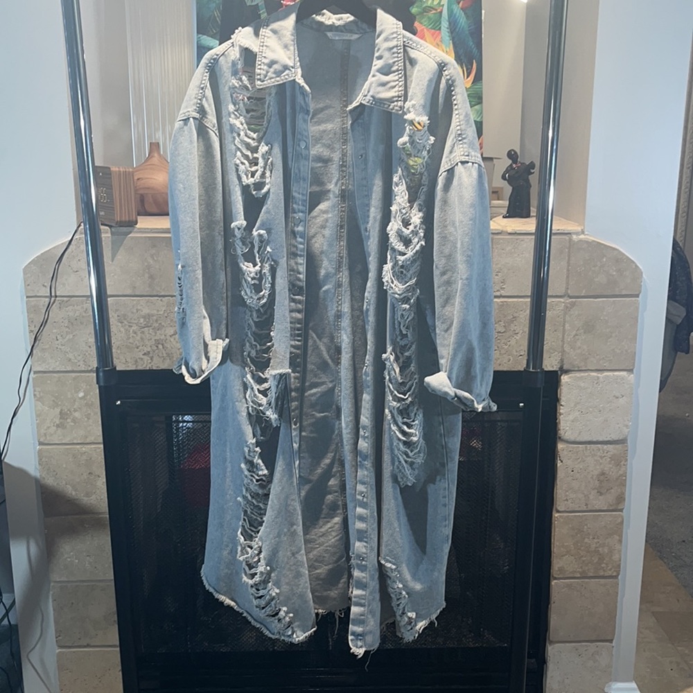 Ripped denim jacket